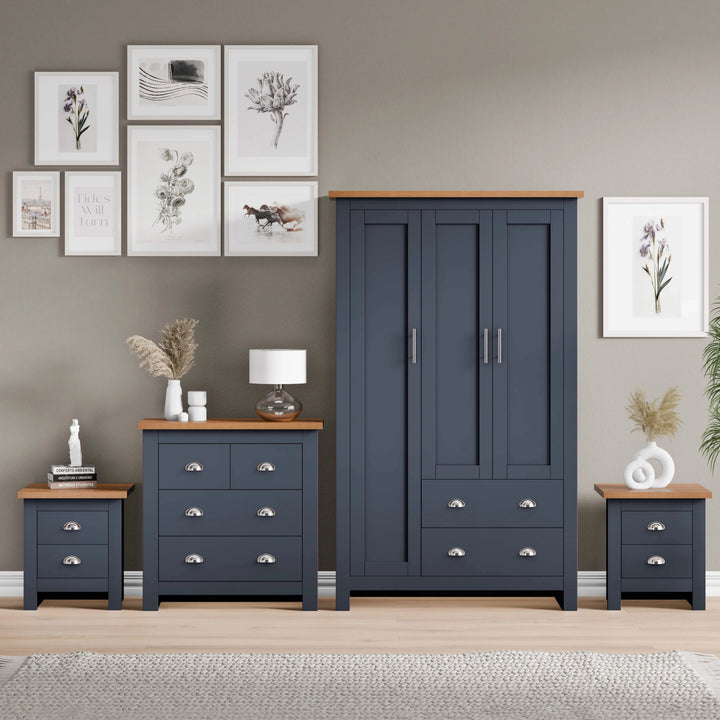 [Blue] Navy wardrobe chest and bedside arranged as Shaker bedroom furniture set against warm grey wall