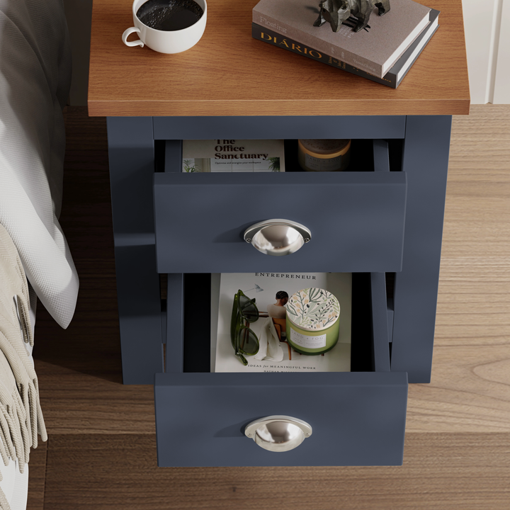 [Blue] overhead shot blue shaker bedside both cup handle drawers open coffee mug and book on oak top