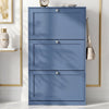 [Blue] Shaker Shoe Cabinet closed three-door flip-front unit against white panelled wall with woven basket and linen tote bag alongside
