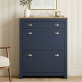 [Blue] Shoe Cabinet With Drawer front view in a styled hallway with oak top, silver cup handles, and a vase and books