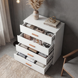 [White] 4 drawer chest of the Blythe bedroom furniture set with all drawers pulled out and items stored in each