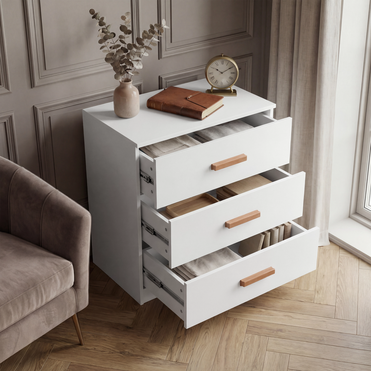 [White] 3 drawer chest of the Blythe bedroom furniture set with all drawers pulled out and striped liners inside