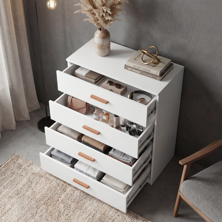 [White] Blythe bedroom furniture set chest showing four open drawers stacked with folded clothing inside
