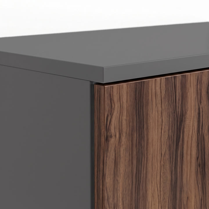 [Walnut] Blythe 2 Door Wardrobe with Shelves and Hanging Rail close-up view grey top and walnut wood-grain door corner.