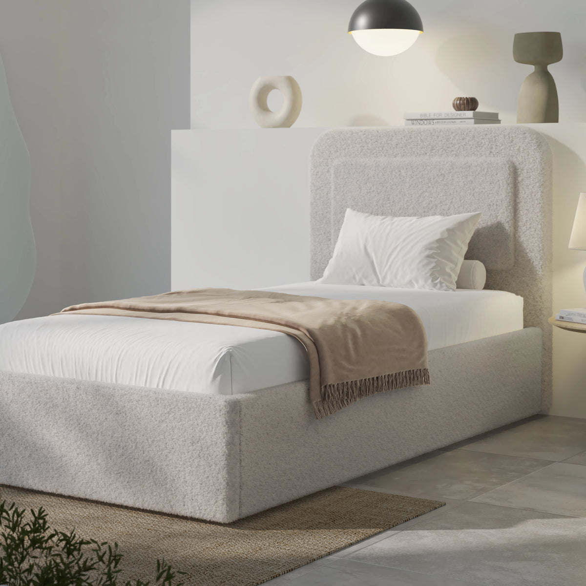 [Single | Grey] Single grey boucle ottoman bed front view, curved headboard and mid-grey duvet styled neatly