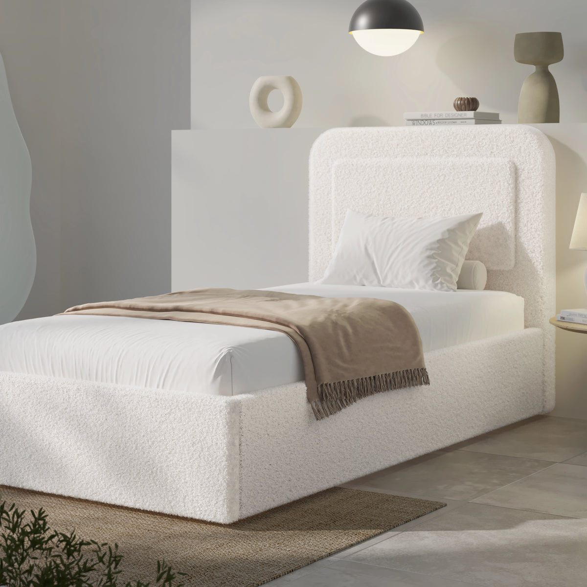 [Single | White] Single white boucle ottoman bed front view with curved headboard and crisp white duvet styled