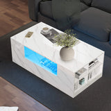 [White Marble] White Marble High Gloss Coffee Table with LED Lights with vase of green stems on top, blue LED on