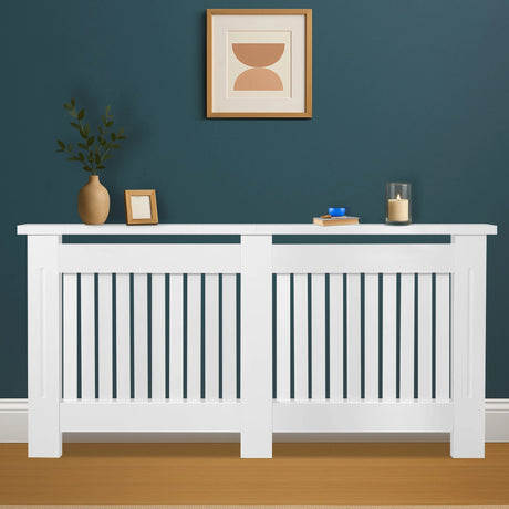[White] Extra large Chelsea white radiator cover on teal wall with two vertical slat panels and stile centre