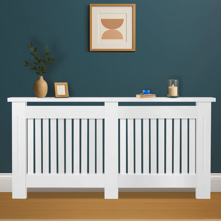 [White] Extra large Chelsea white radiator cover on teal wall with two vertical slat panels and stile centre