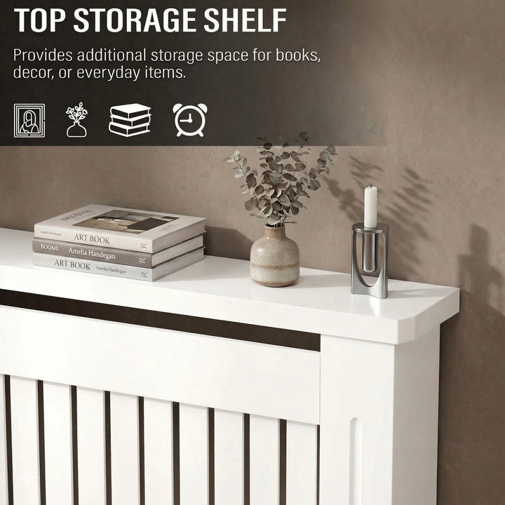 [Large] Chelsea White Radiator Cover  top shelf close-up styled with stacked art books, ceramic bud vase, and silver candle holder