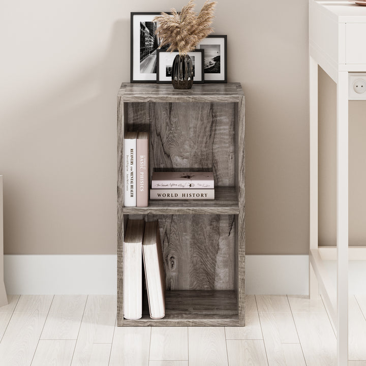 [2 Shelf | Coach Wood] straight face of coach-wood panel under-window short cube bookcase over oak board floor