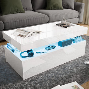 [White] high gloss storage coffee table in front of grey sofa, blue LED mid shelf holds headphones and toy car