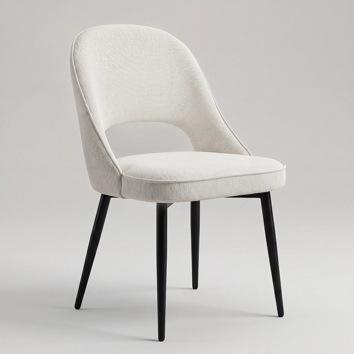 [Cream | Set of 4] Fabric chair with rounded padded back, open cut-out, piped seat and black legs.