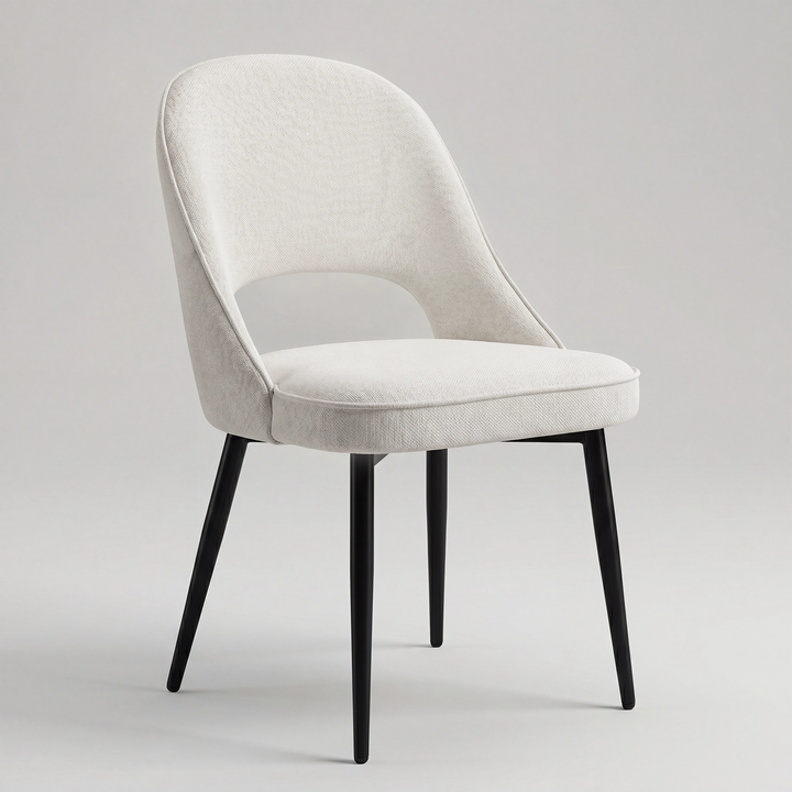 [Cream | Set of 4] Fabric chair with rounded padded back, open cut-out, piped seat and black legs.