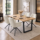[Cream | Set of 2] Two pairs of swivel fabric dining chairs at a wood table set for four styled with wine glasses and a vase.
