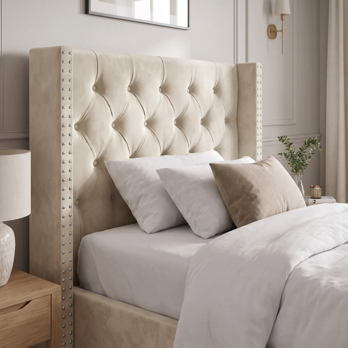 [Single | Beige] Detail shot of Cross ottoman bed headboard showing buttoned diamonds and nailhead studs