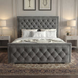 [Double | Grey] Front view of cross-puffed ottoman bed centred between matching nightstands with crystal lamps