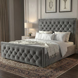 [King | Grey] Side angle of velvet ottoman bed with deep chesterfield button-tufted headboard and matching footboard