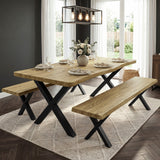 [Light Oak] Crosswick Industrial 6 Seater Dining Table with Benches positioned in a modern dining room featuring large windows, a geometric pendant light fixture, and a diamond-patterned rug
