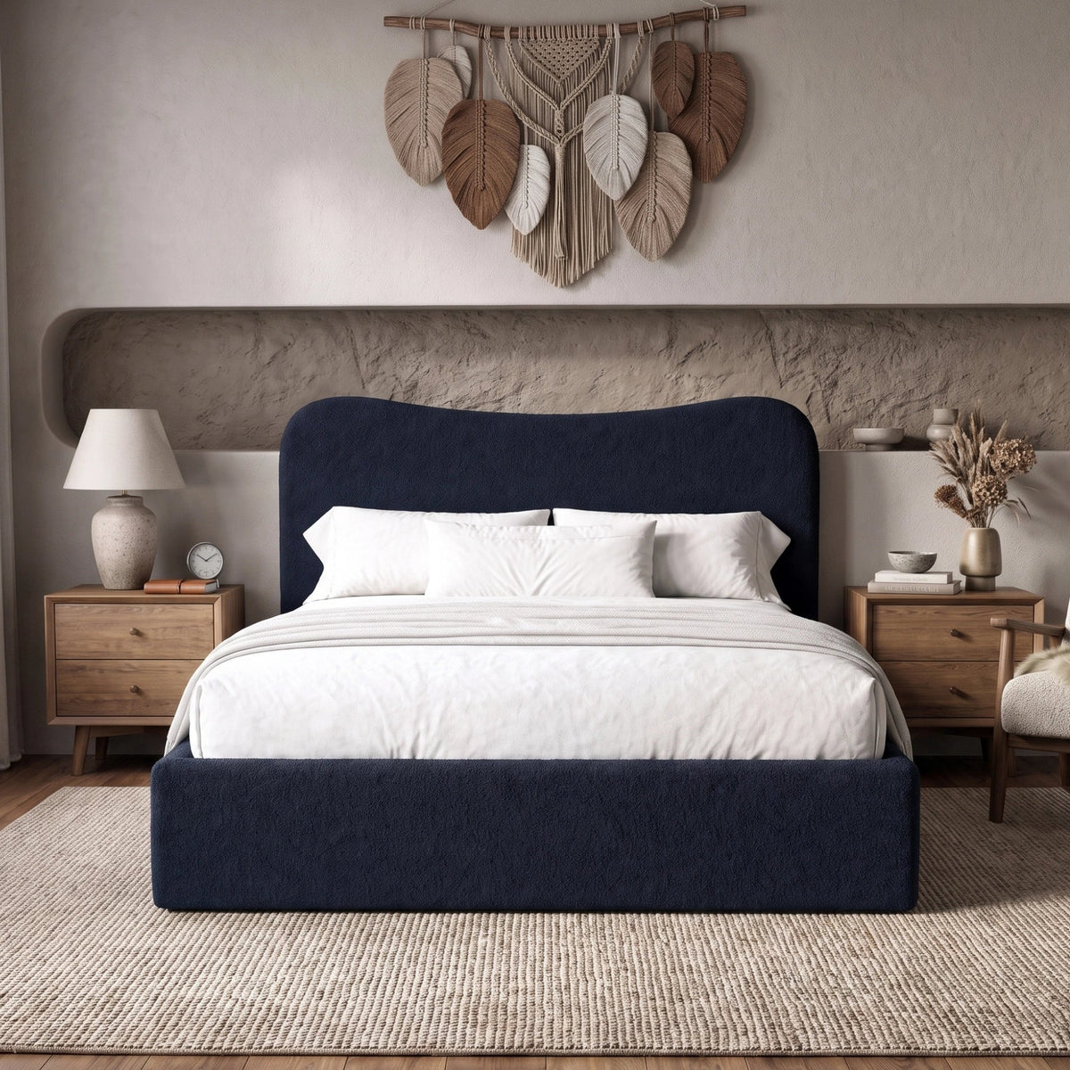 [Double | Blue] Front view of blue boucle double ottoman bed with curved headboard from front in natural day light.