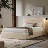 [Double | Beige] Wide angle of boucle ottoman bed in loft room with reclaimed timber beam and floating shelf with art
