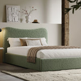 [Double | Sage Green] Curved headboard ottoman bed in loft-style room with exposed beam and cream shag rug on concrete floor
