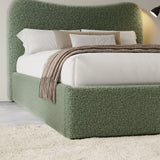 [Double | Sage Green] Closer view of headboard curve and bedding arrangement with textured boucle fabric visible