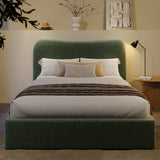 [King | Sage Green] Front view of boucle ottoman bed with curved headboard in warm ambient evening lighting