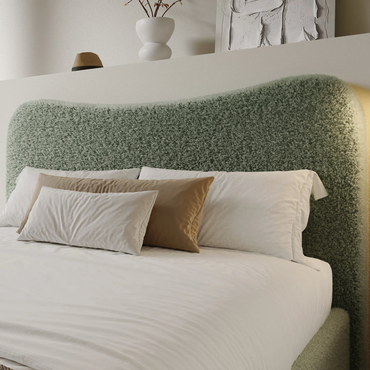 [King | Sage Green] Close-up of organic wave-shaped headboard showing boucle fabric texture with looped yarn detail