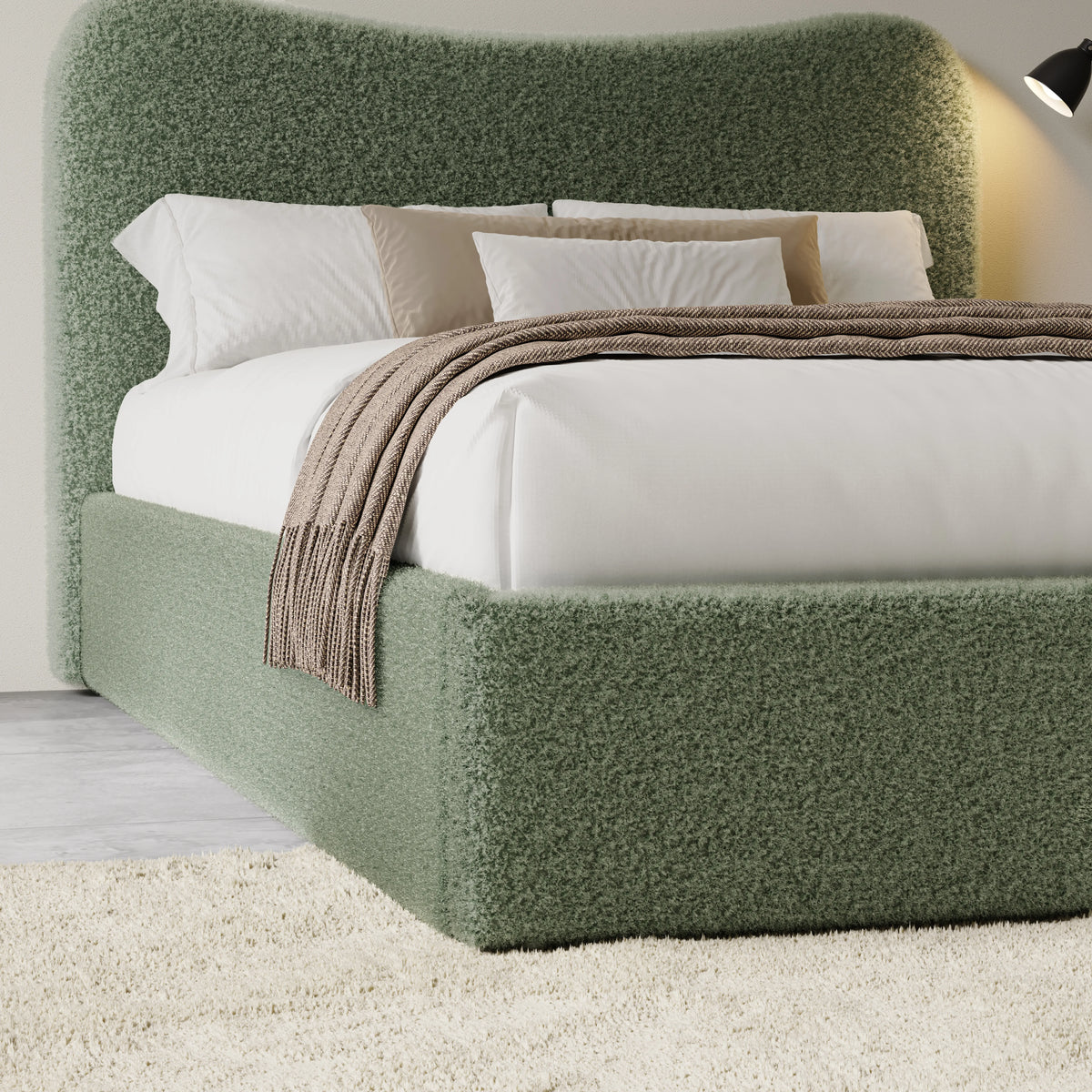 [King | Sage Green] Closer view of headboard curve and bedding arrangement with textured boucle fabric visible