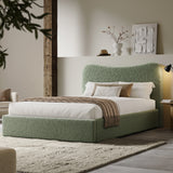 [King | Sage Green] Wide angle of boucle ottoman bed in loft room with reclaimed timber beam and floating shelf with art