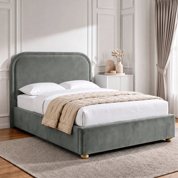 [Grey | Double] Curved headboard ottoman bed closed in bedroom, with plush grey upholstery and soft rounded edges