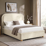 [Beige | King] Curved headboard ottoman bed closed in bedroom, with plush beige upholstery and soft rounded edges