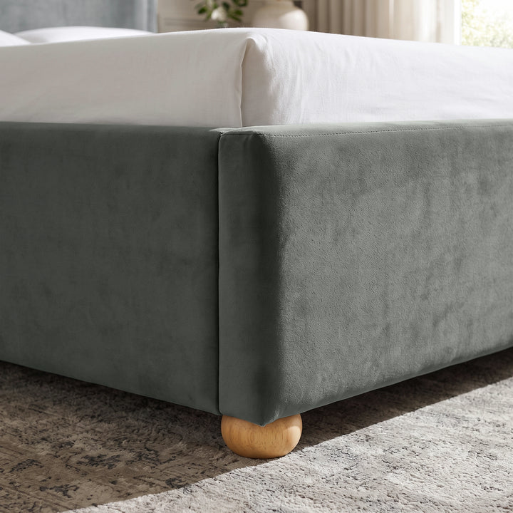 [Grey | King] Close-up of plush upholstered base corner with rounded solid wood foot and soft curved edge