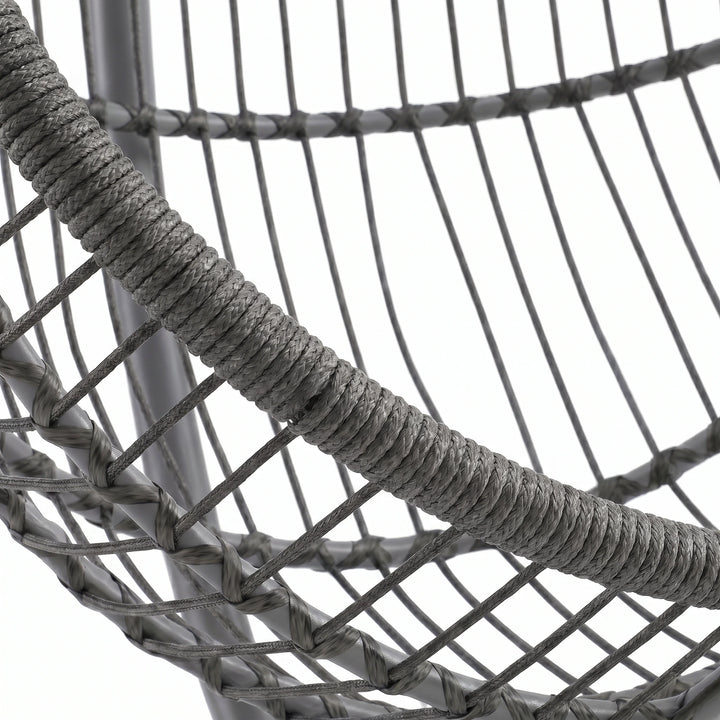 [Dark Grey] Close-up of a wire chair with gray rope detailing on a white background