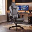 [Dark Grey + Light Grey] Ergonomic Gaming Chair with Footrest positioned in front of a gaming desk setup.
