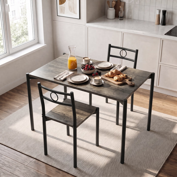 [Dark Wood] Kitchen breakfast scene with the table set for two, orange juice, cups, berries, pastries, plates and cutlery