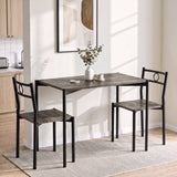 [Dark Wood] Bright kitchen lifestyle view with the two-chair table set, white mugs, coasters and a vase on the tabletop
