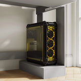 [Grey] Grey home office desk lower-right detail showing black PC tower with three yellow honeycomb front fans