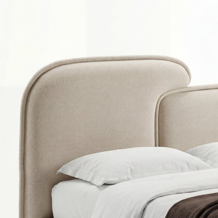 [Double | Beige] Close-up of beige split headboard with stitched upholstery and gently curved upper edge of double bed frame