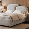 [Double | Grey] Styled grey double ottoman bed frame with curved split headboard beside lamps and nightstands