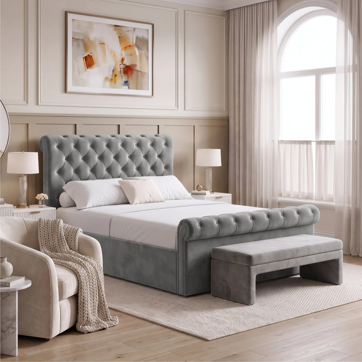 [Double | Grey] Styled room view with rolled footboard, bench, armchair, chunky throw, rug, and sheer curtains
