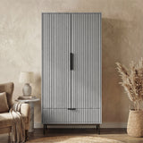 [Grey] Flutrina design 2 door wardrobe with black door handles and legs placed against a wall in a room