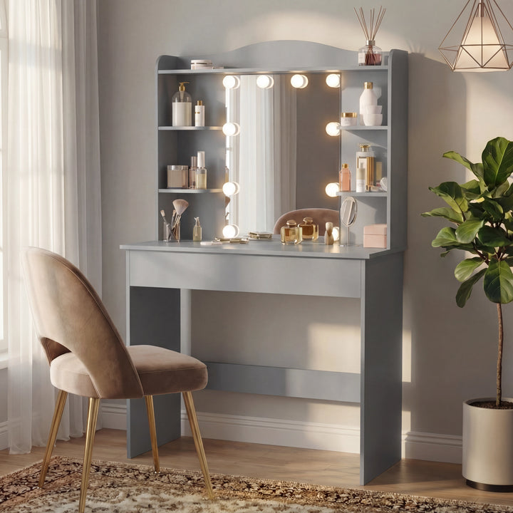 [Grey] grey dressing table with lit Hollywood mirror, six side shelves of perfumes, beige tub chair on rug