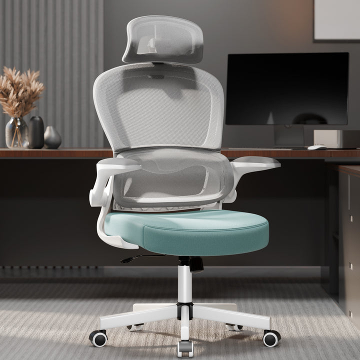 [Tiffany Blue + Grey] Ergonomic computer chair with teal cushion and mesh back in a stylish home office. Designed for lumbar support and extended desk use.