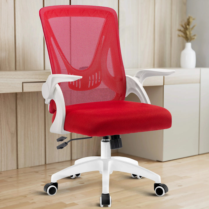 [Red] The red mesh chair in a home office, complemented by a desk, offers both comfort and style for long hours of work.