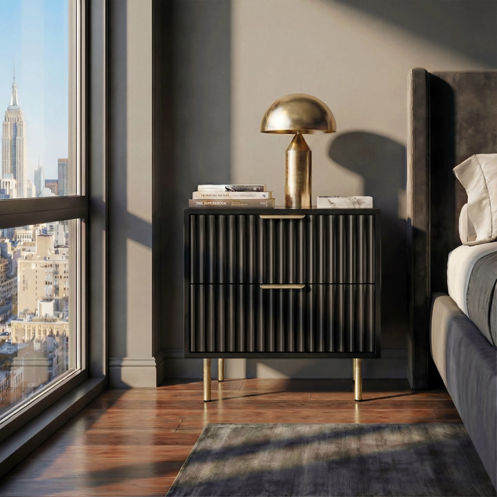 [Black] nightstand unit with two drawers in flutrina design placed against a wall in a bedroom setting