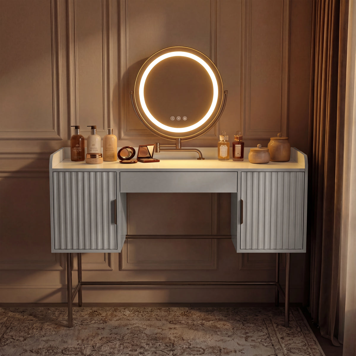 [White] white flutrina dressing table with warm amber-lit round LED mirror against panelled brown wall, no stool in shot