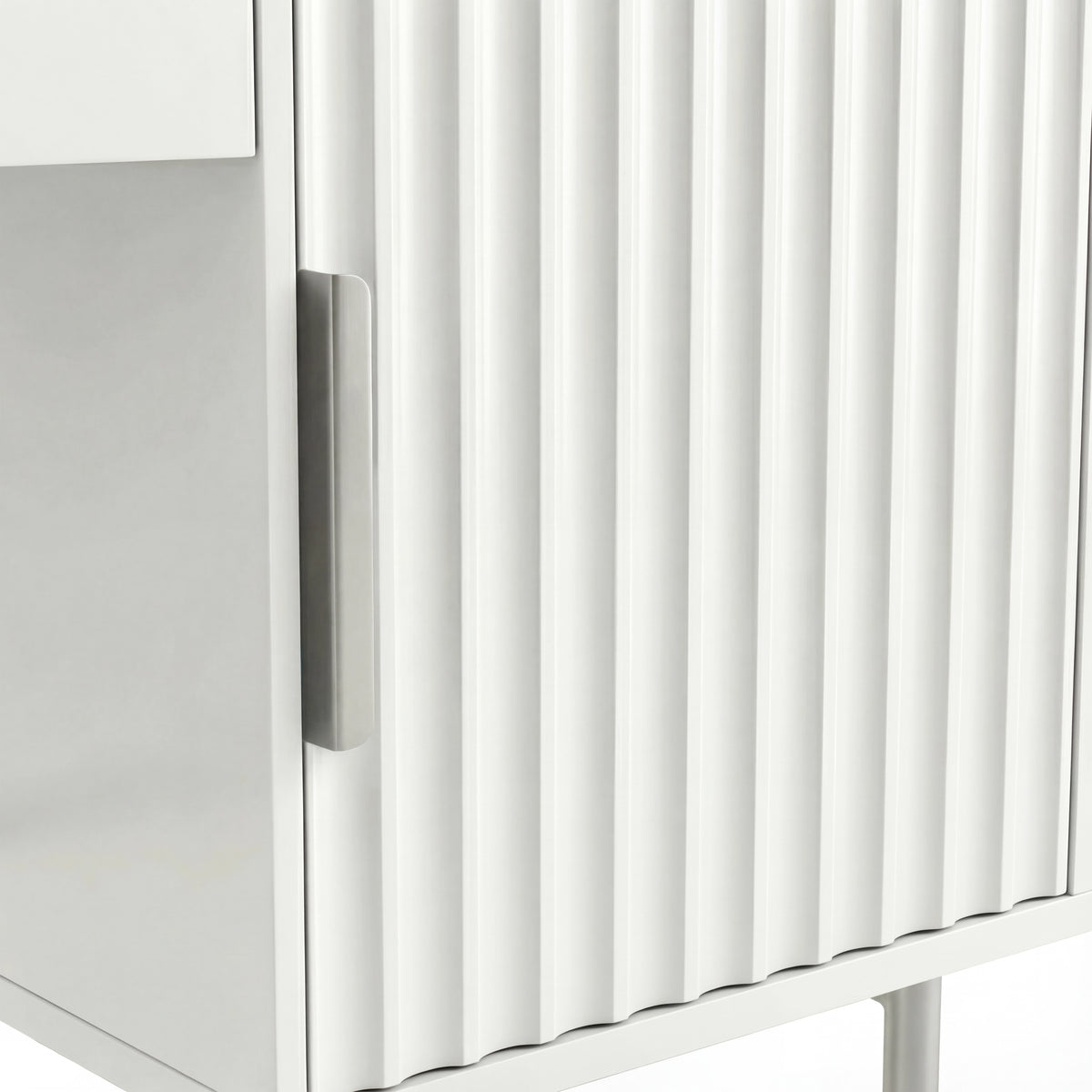 [White] Close-up of a white flutrina vanity table with a modern, minimalist design and a silver handle on the drawer