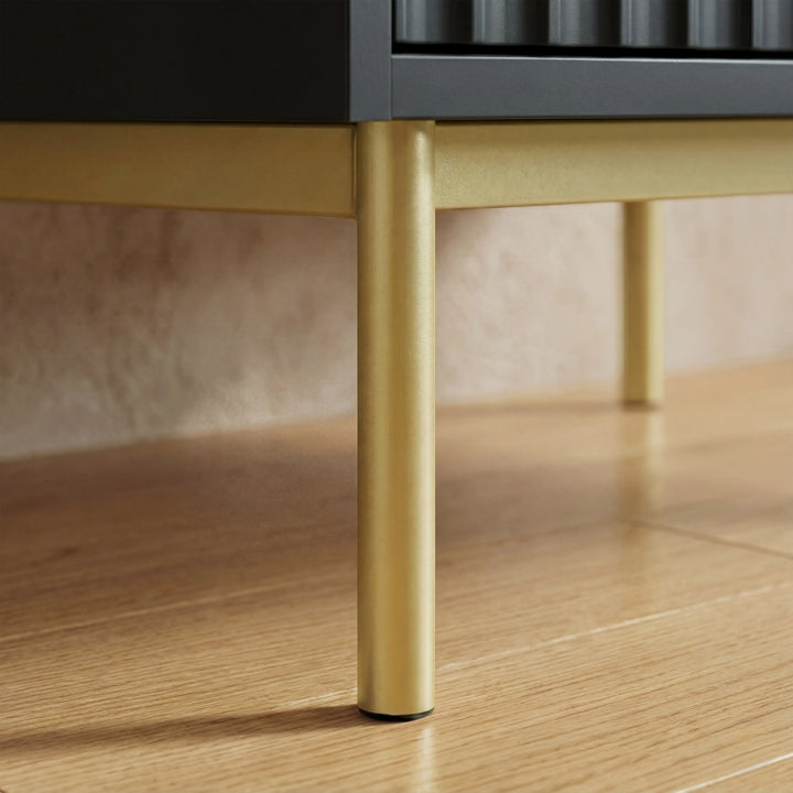 [Black] wardrobe three door cabinet raised on golden finish metal legs with sturdy lower frame construction